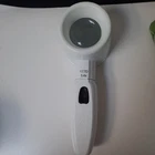 5.4X Coil Led Lighted Hand Held, Stand Magnifier - 17.7D Used. Price: $79.00.