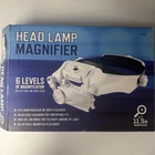 Lamp Magnifier With 6 Levels Of Magnification! Adjustable Headband! #58788 New. Price: $19.99.