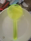 Kikkerland Design 2 1 Neon Green Acrylic Magnifying Glass Used. Price: $18.99.