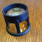 Vintage Coil Stand Magnifier Item #5123 Used. Price: $12.00.