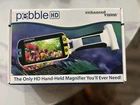 Enhanced Vision Pebble Hd Portable Magnifier 4.3" Color Screen 13X Magnification Used. Price: $84.50.
