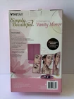 Vivitar Simply Beautiful Tri-fold Led Lighted Magnifying Vanity Mirror Pink New. Price: $29.00.